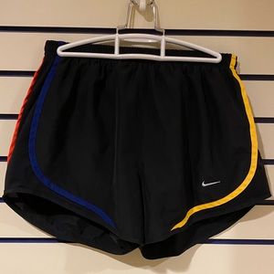 Black nike shorts with multi colored details in M
